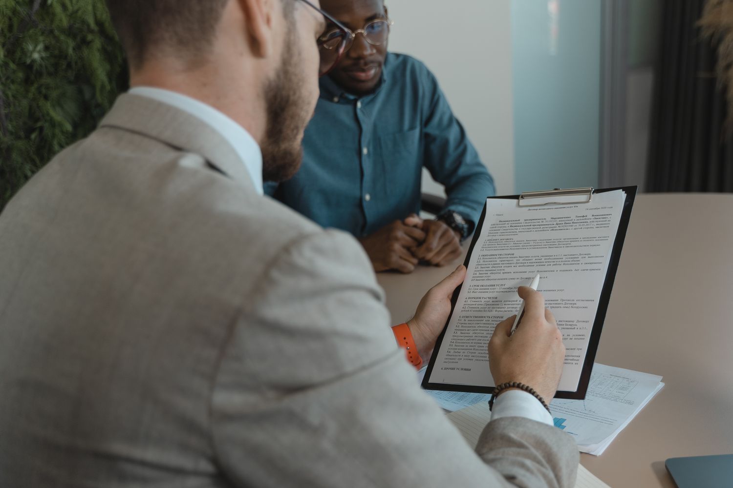 Recruiter reviewing a candidate document during an interview